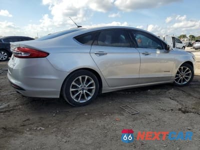 Trzecie zdjęcie samochodu z tyłu: 2017 FORD FUSION SE HYBRID VIN:3FA6P0LU3HR141571 - miniatura