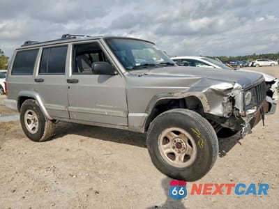 Czwarte zdjęcie samochodu z boku: 2001 JEEP CHEROKEE SPORT VIN:1J4FT48SX1L570208 - miniatura