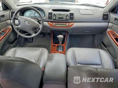 Zdjęcie 8 z 12 samochodu: 2003 TOYOTA CAMRY LE VIN:4T1BF32K53U057049 - miniatura