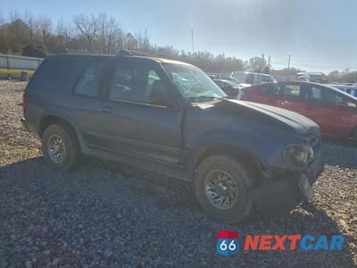 Czwarte zdjęcie samochodu z boku: 1999 FORD EXPLORER VIN:1FMYU22X8XUC74980 - miniatura