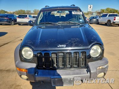 Piąte zdjęcie samochodu w środku: 2002 JEEP LIBERTY SPORT VIN:1J4GL48K72W245925 - miniatura