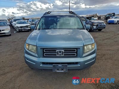 Piąte zdjęcie samochodu w środku: 2006 HONDA RIDGELINE RTL VIN:2HJYK16546H517145 - miniatura