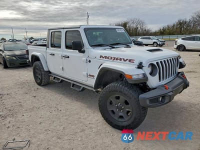 Czwarte zdjęcie samochodu z boku: 2023 JEEP GLADIATOR MOJAVE VIN:1C6JJTEG0PL508879 - miniatura