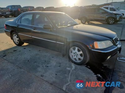 Czwarte zdjęcie samochodu z boku: 2002 ACURA 3.5RL VIN:JH4KA96542C012309 - miniatura