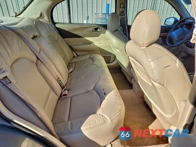 Zdjęcie 10 z 14 samochodu: 2000 LINCOLN CONTINENTAL VIN:1LNHM97V8YY892407 - miniatura