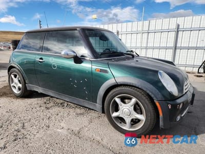 Czwarte zdjęcie samochodu z boku: 2006 MINI COOPER VIN:WMWRC33536TK71128 - miniatura