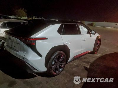 Trzecie zdjęcie samochodu z tyłu: 2024 TOYOTA BZ4X XLE VIN:JTMAAAAA8RA033169 - miniatura