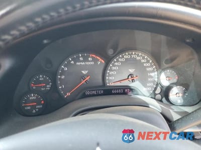 Zdjęcie 9 z 12 samochodu: 2004 CHEVROLET CORVETTE VIN:1G1YY22G345133404 - miniatura