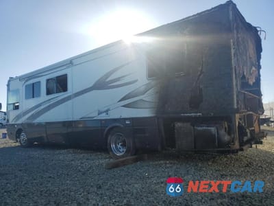 Trzecie zdjęcie samochodu z tyłu: 2001 NATIONAL RV TRADEWINDS RECREATIONAL VEHICLE VIN:4UZAAHAK51CH92760 - miniatura