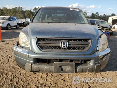 Piąte zdjęcie samochodu w środku: 2005 HONDA PILOT EXL VIN:2HKYF18745H549896 - miniatura