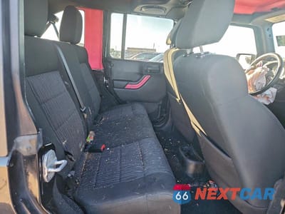 Zdjęcie 10 z 12 samochodu: 2011 JEEP WRANGLER UNLIMITED RUBICON VIN:1J4BA6H13BL580118 - miniatura