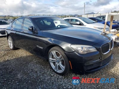 Czwarte zdjęcie samochodu z boku: 2012 BMW 750 I VIN:WBAKA8C56CDS99676 - miniatura