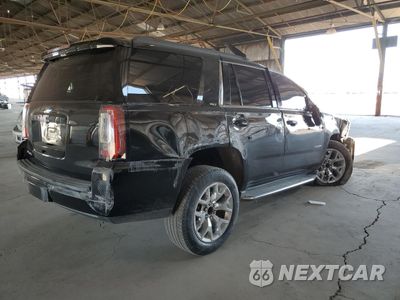 Trzecie zdjęcie samochodu z tyłu: 2016 GMC YUKON SLT VIN:1GKS1BKC0GR398233 - miniatura