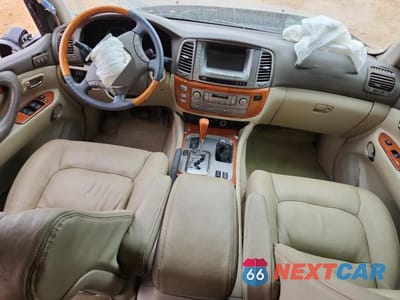 Zdjęcie 8 z 13 samochodu: 2004 LEXUS LX 470 VIN:JTJHT00W543540699 - miniatura