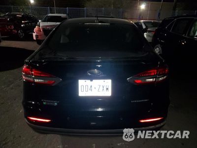 Zdjęcie 6 z 14 samochodu: 2019 FORD FUSION TIT VIN:3FA6P0SU6KR144439 - miniatura