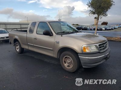 Czwarte zdjęcie samochodu z boku: 2003 FORD F150 VIN:1FTRX17W73KB19093 - miniatura