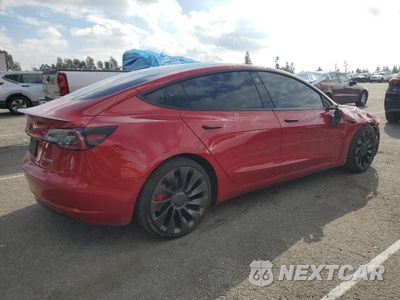 Trzecie zdjęcie samochodu z tyłu: 2021 TESLA MODEL 3 VIN:5YJ3E1ECXMF097321 - miniatura
