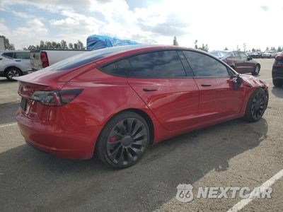 Trzecie zdjęcie samochodu z tyłu: 2021 TESLA MODEL 3 VIN:5YJ3E1ECXMF097321 - miniatura