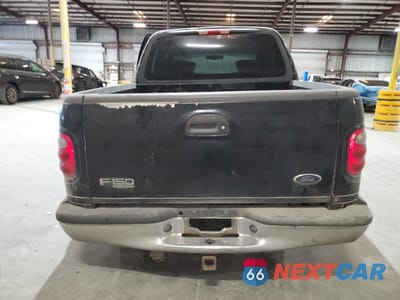 Zdjęcie 6 z 13 samochodu: 2001 FORD F150 SUPERCREW VIN:1FTRW07L11KC61147 - miniatura