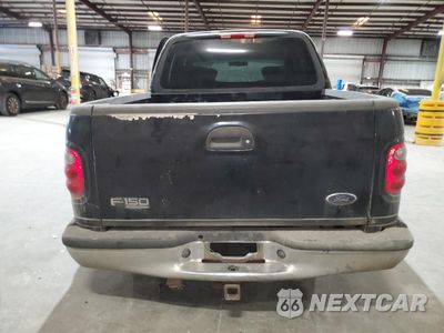 Zdjęcie 6 z 13 samochodu: 2001 FORD F150 SUPERCREW VIN:1FTRW07L11KC61147 - miniatura