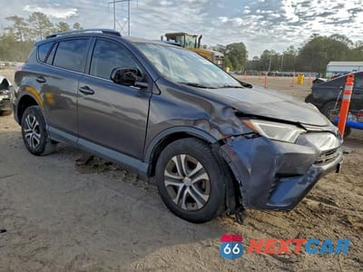 Czwarte zdjęcie samochodu z boku: 2017 TOYOTA RAV4 LE VIN:JTMZFREV8HJ147994 - miniatura