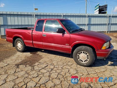 Czwarte zdjęcie samochodu z boku: 1999 GMC SONOMA VIN:1GTCT19XXX8506800 - miniatura