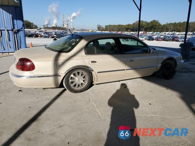 Trzecie zdjęcie samochodu z tyłu: 2002 LINCOLN CONTINENTAL VIN:1LNHM97V12Y690290 - miniatura