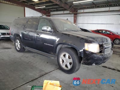 Czwarte zdjęcie samochodu z boku: 2007 CHEVROLET SUBURBAN C1500 VIN:3GNFC16067G214518 - miniatura