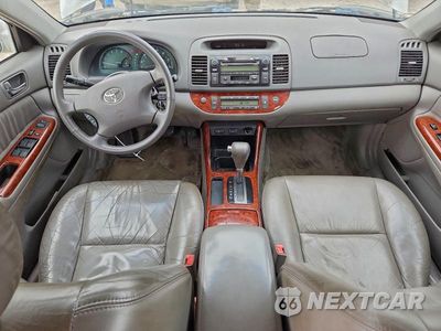 Zdjęcie 8 z 12 samochodu: 2003 TOYOTA CAMRY VIN:4T1BE30KX3U194672 - miniatura