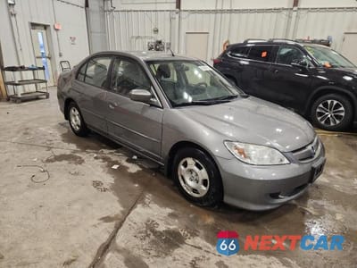 Czwarte zdjęcie samochodu z boku: 2004 HONDA CIVIC HYBRID VIN:JHMES96674S018701 - miniatura