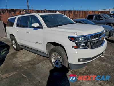 Czwarte zdjęcie samochodu z boku: 2020 CHEVROLET SUBURBAN C1500 LT VIN:1GNSCHKC3LR250832 - miniatura