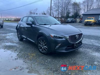Czwarte zdjęcie samochodu z boku: 2016 MAZDA CX-3 GRAND TOURING VIN:JM1DKBD72G0111514 - miniatura