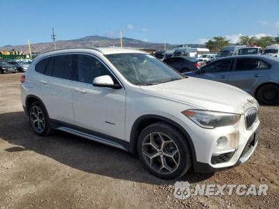 Czwarte zdjęcie samochodu z boku: 2017 BMW X1 SDRIVE28I VIN:WBXHU7C34H5H35073 - miniatura