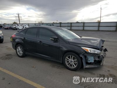 Czwarte zdjęcie samochodu z boku: 2016 FORD FOCUS SE VIN:1FADP3F23GL377833 - miniatura