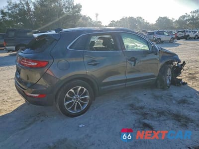 Trzecie zdjęcie samochodu z tyłu: 2018 LINCOLN MKC SELECT VIN:5LMCJ2C97JUL08298 - miniatura