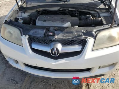 Zdjęcie 12 z 13 samochodu: 2005 ACURA MDX TOURING VIN:2HNYD18955H526122 - miniatura