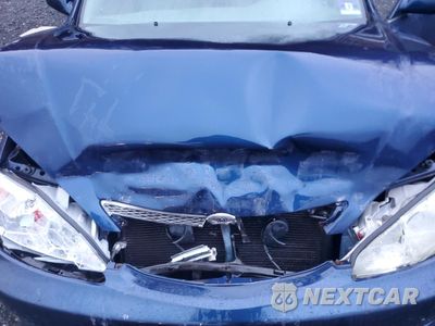 Zdjęcie 11 z 14 samochodu: 2002 TOYOTA CAMRY LE VIN:4T1BE32K92U577692 - miniatura