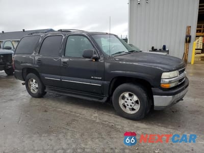 Czwarte zdjęcie samochodu z boku: 2001 CHEVROLET TAHOE K1500 VIN:1GNEK13T71J255341 - miniatura
