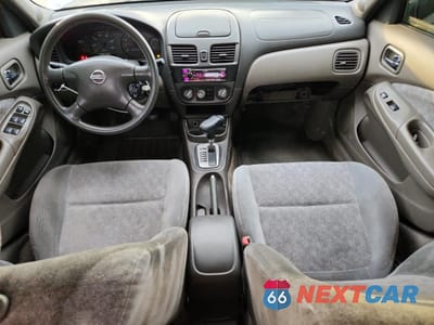 Zdjęcie 8 z 15 samochodu: 2003 NISSAN SENTRA GXE VIN:3N1CB51AX3L556869 - miniatura