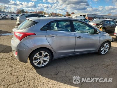 Trzecie zdjęcie samochodu z tyłu: 2013 HYUNDAI ELANTRA GT VIN:KMHD35LE0DU049089 - miniatura