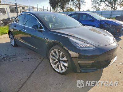 Czwarte zdjęcie samochodu z boku: 2019 TESLA MODEL 3 VIN:5YJ3E1EB2KF408468 - miniatura