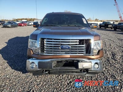 Piąte zdjęcie samochodu w środku: 2011 FORD F150 SUPERCREW VIN:1FTFW1ET2BFC88265 - miniatura
