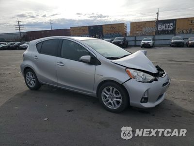 Czwarte zdjęcie samochodu z boku: 2013 TOYOTA PRIUS C VIN:JTDKDTB37D1051226 - miniatura