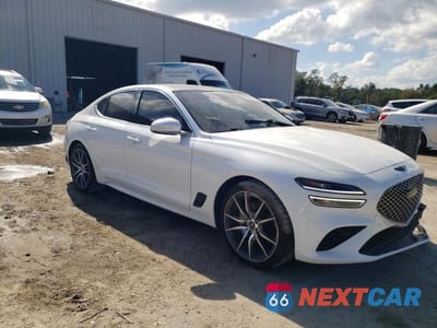 Czwarte zdjęcie samochodu z boku: 2022 GENESIS G70 2.0T VIN:KMTG34TA5NU086697 - miniatura