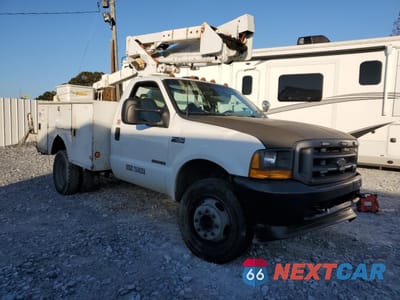 Czwarte zdjęcie samochodu z boku: 1999 FORD F450 SUPER DUTY BUCKET TRUCK VIN:1FDXF46FXXEE74790 - miniatura
