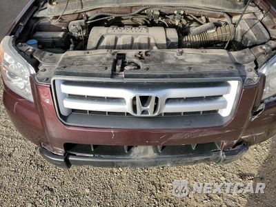 Zdjęcie 12 z 13 samochodu: 2007 HONDA PILOT EXL VIN:2HKYF18587H532147 - miniatura