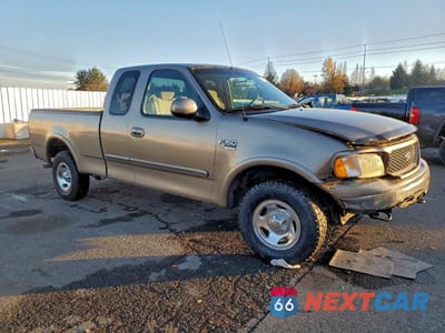 Czwarte zdjęcie samochodu z boku: 2002 FORD F150 VIN:2FTRX18W32CA70637 - miniatura