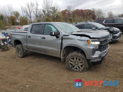 Czwarte zdjęcie samochodu z boku: 2023 CHEVROLET SILVERADO K1500 LT TRAIL BOSS VIN:3GCUDFEL6PG210619 - miniatura
