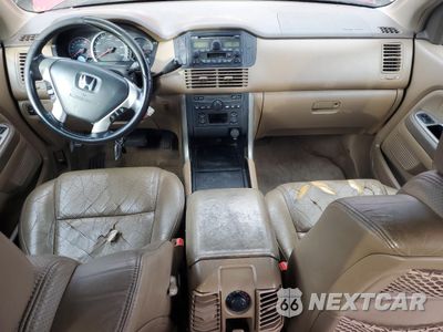 Zdjęcie 8 z 13 samochodu: 2004 HONDA PILOT EXL VIN:2HKYF18574H569573 - miniatura