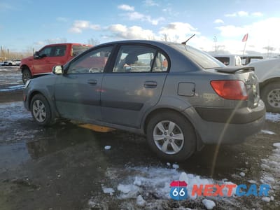 Drugie zdjęcie samochodu z przodu: 2009 KIA RIO BASE VIN:KNADE223296566738 - miniatura